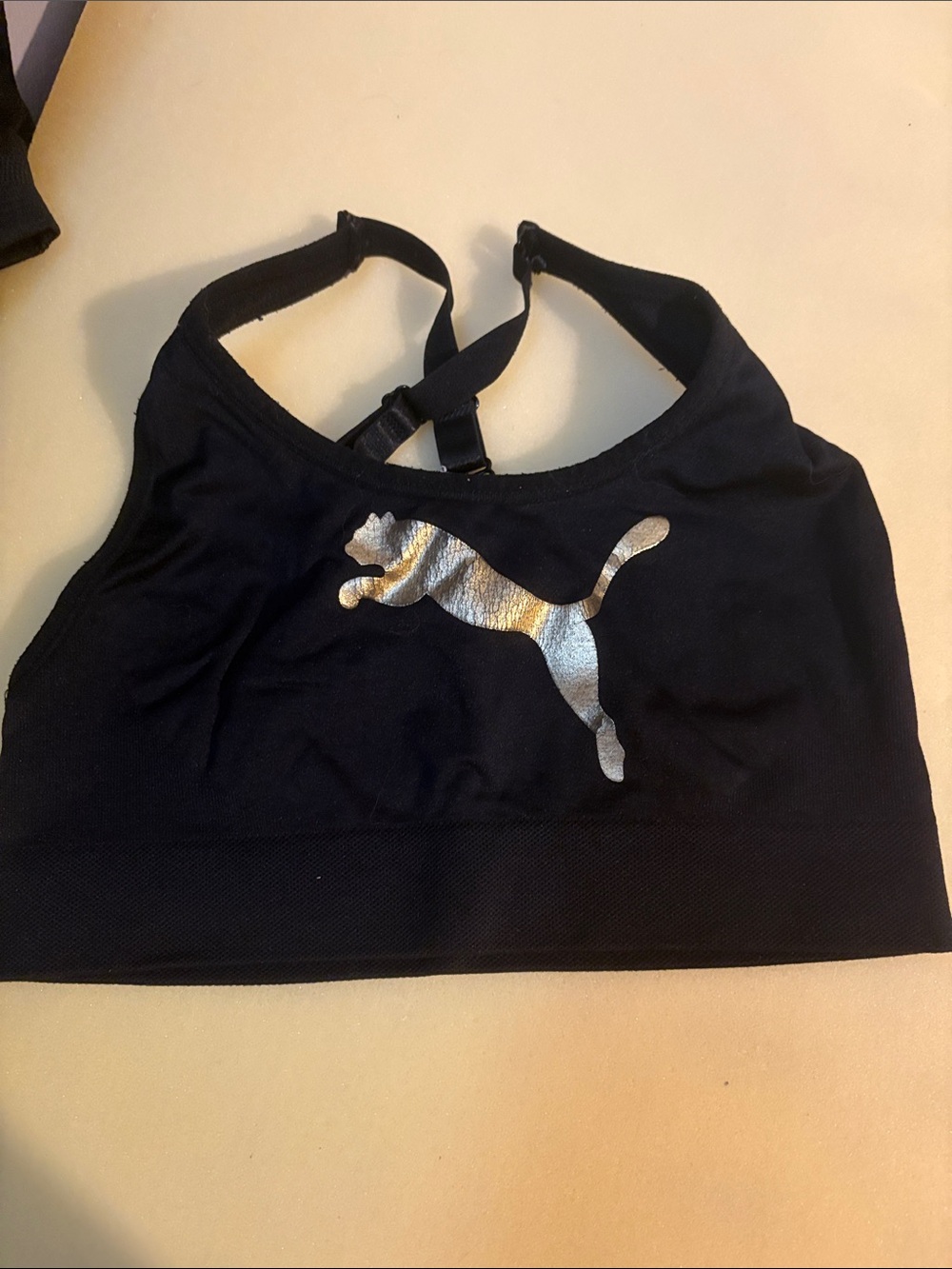 Puma Black Sports Bra with Metallic Gold Logo
